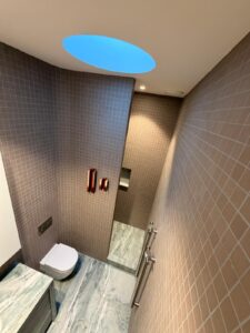 Interior commercial caulking: Toilet