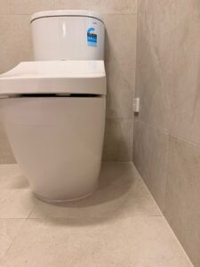 Interior commercial caulking: Toilet