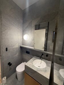 Interior commercial caulking: Toilet